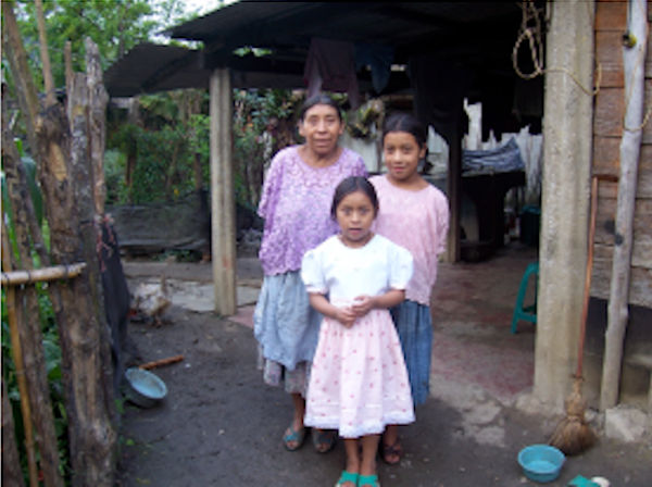 Evelin with her mother and sister